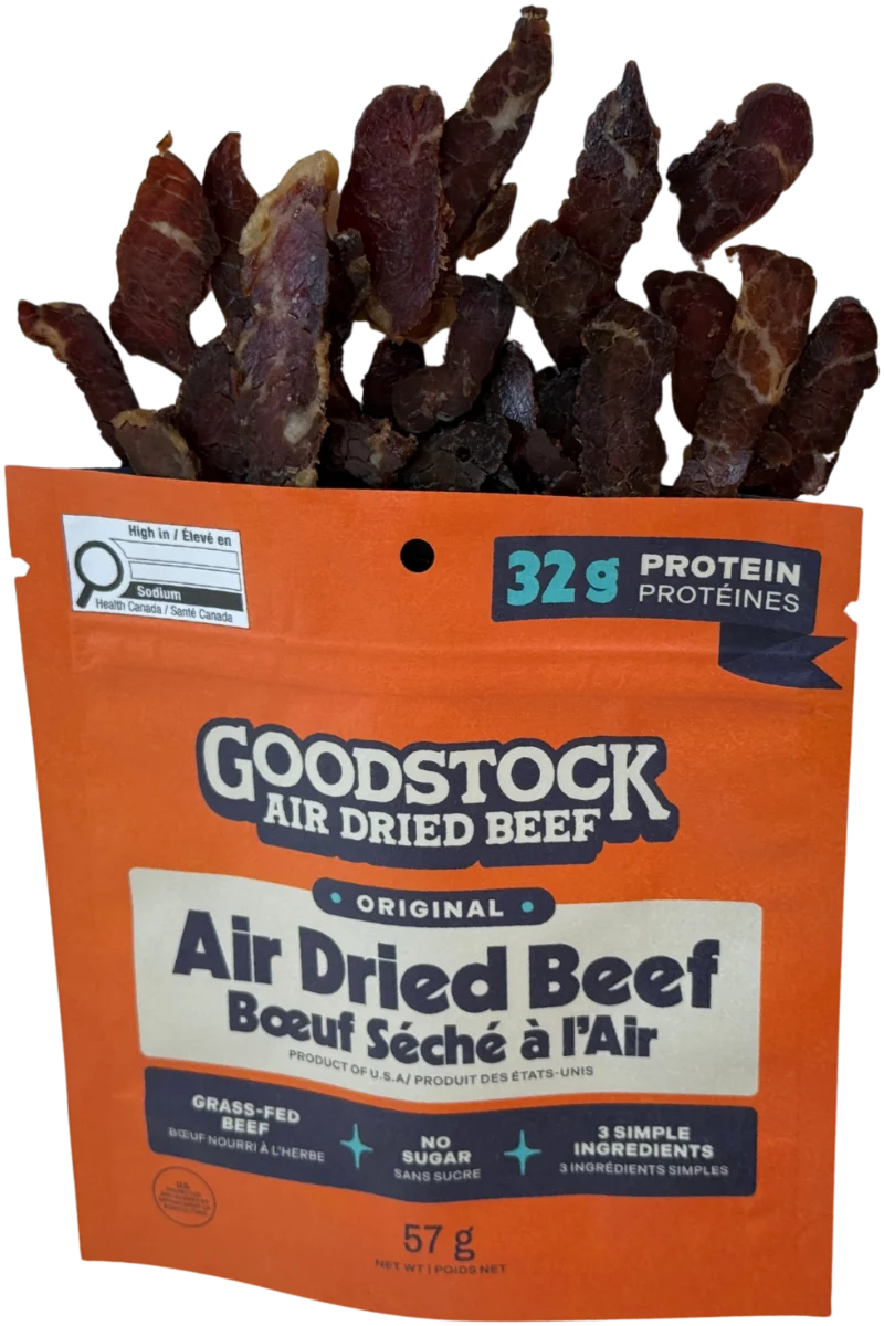 Goodstock Original Air Dried Beef pouch, 57 g, open with sliced biltong spilling out